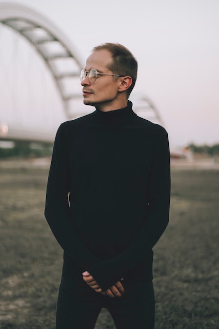 black turtleneck sweater with black pants