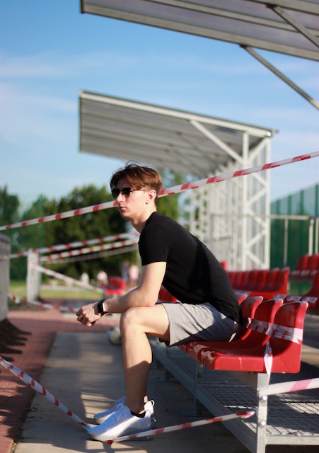 grey shorts with black shirts sneakers