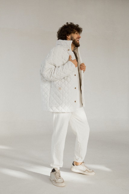 white jogger with quilted jacket