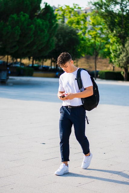 white shirts with blue pants sneakers