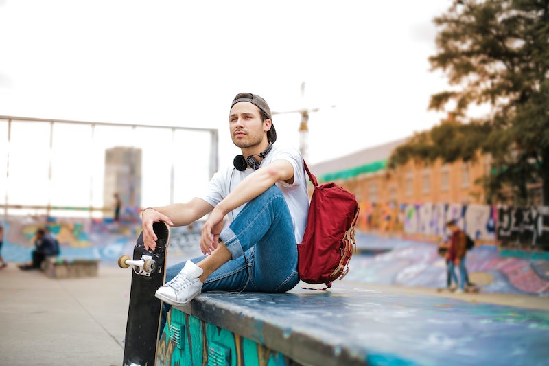 white sneakers with blue jeans and white shirt