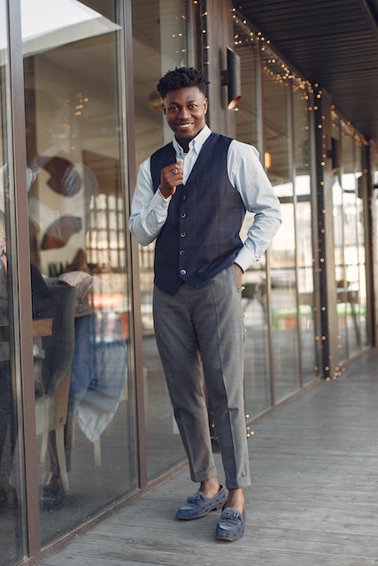 vest with dress shirts and grey pants